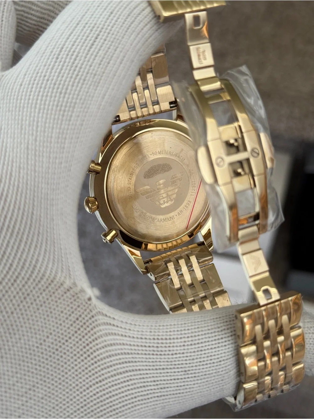 Emporio Armani men’s classic Gold-Tone Watch with Black Dial